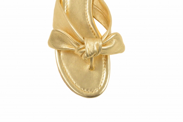 Złote skórzane japonki klapki damskie płaskie wiązanie kokardka